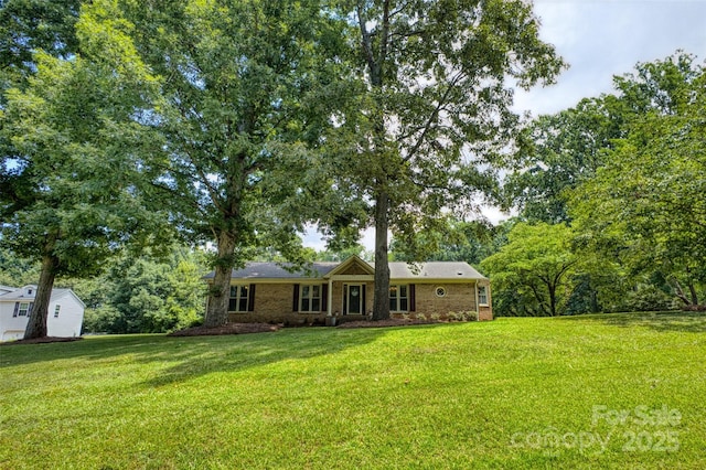 924 Holly Rd, Rock Hill, SC 29730 - rear view of house featuring a yard and brick siding