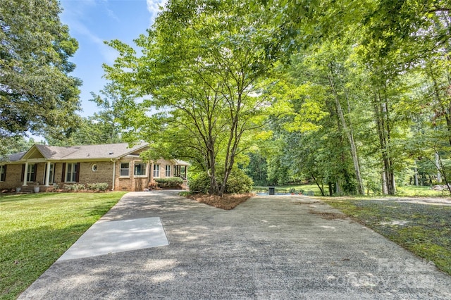 924 Holly Rd, Rock Hill, SC 29730 - view of front of property featuring brick siding, concrete driveway, and a front yard