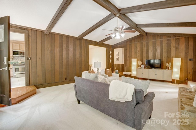 924 Holly Rd, Rock Hill, SC 29730 - living area with light colored carpet, ceiling fan, and wood walls