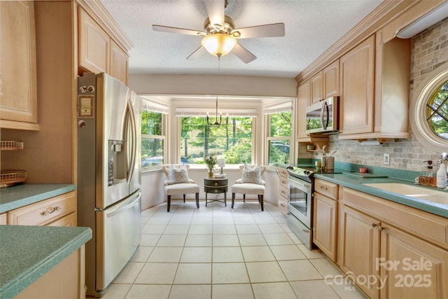 924 Holly Rd, Rock Hill, SC 29730 - kitchen with appliances with stainless steel finishes, light brown cabinetry, light tile patterned floors, a ceiling fan, and a textured ceiling