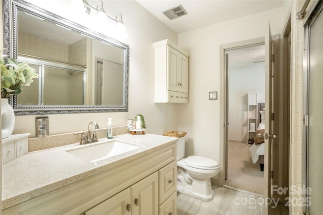 924 Holly Rd, Rock Hill, SC 29730 - bathroom with vanity, wood finished floors, and a stall shower