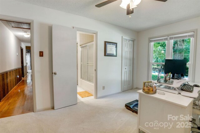 924 Holly Rd, Rock Hill, SC 29730 - home office featuring attic access, a ceiling fan, light colored carpet, wooden walls, and wainscoting