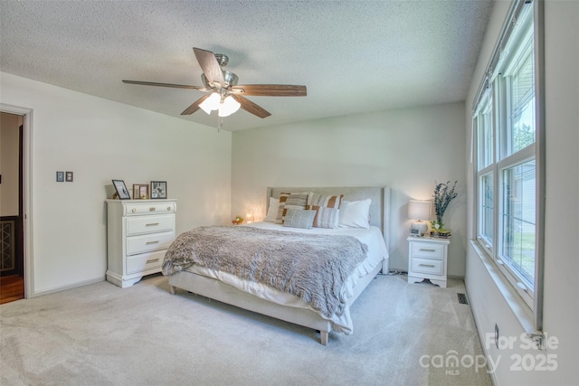 924 Holly Rd, Rock Hill, SC 29730 - bedroom with light colored carpet, a textured ceiling, and ceiling fan