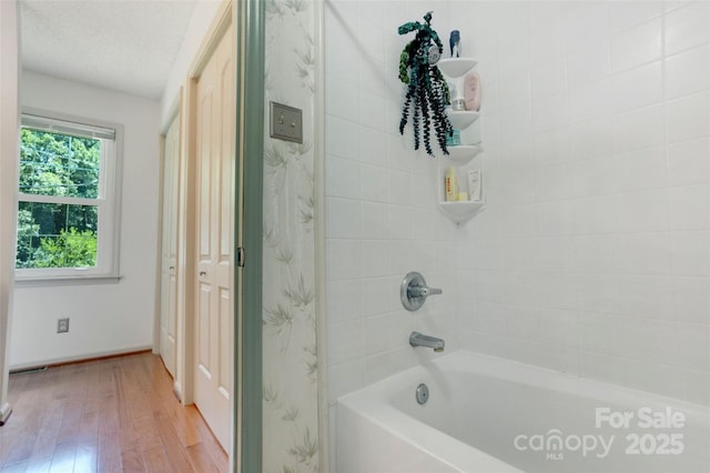 924 Holly Rd, Rock Hill, SC 29730 - full bathroom with wood finished floors and shower / washtub combination