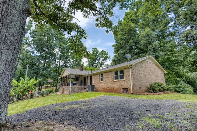 924 Holly Rd, Rock Hill, SC 29730 - view of front of house with brick siding, a front yard, and a chimney