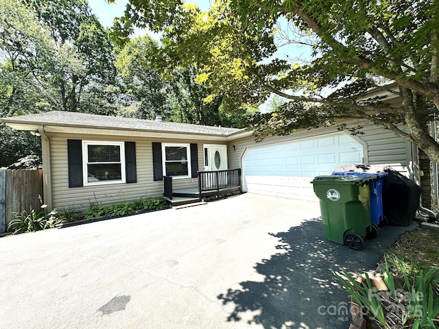 25 Norman Rd, Fletcher, NC 28732 - view of front facade with driveway and an attached garage