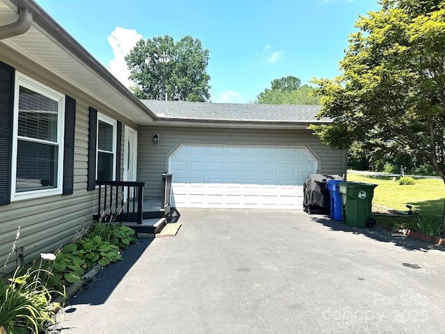 25 Norman Rd, Fletcher, NC 28732 - garage featuring asphalt driveway