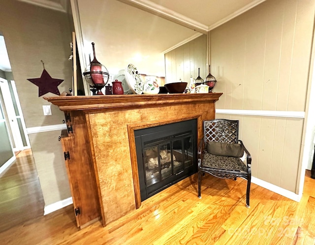 25 Norman Rd, Fletcher, NC 28732 - detailed view of a glass covered fireplace, wood finished floors, and ornamental molding
