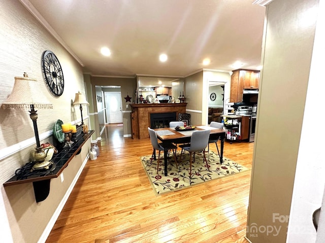 25 Norman Rd, Fletcher, NC 28732 - dining space with ornamental molding, light wood-type flooring, a fireplace, and recessed lighting