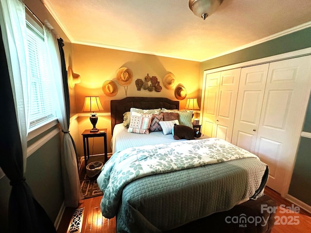 25 Norman Rd, Fletcher, NC 28732 - bedroom featuring a closet, crown molding, and wood finished floors