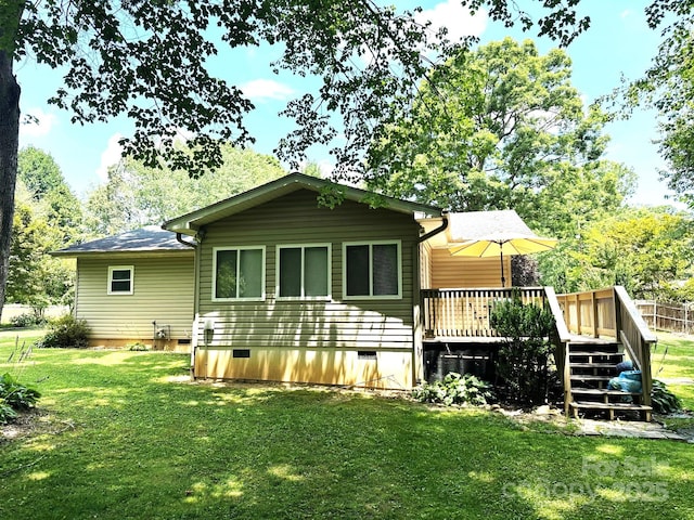25 Norman Rd, Fletcher, NC 28732 - rear view of house with crawl space and a wooden deck