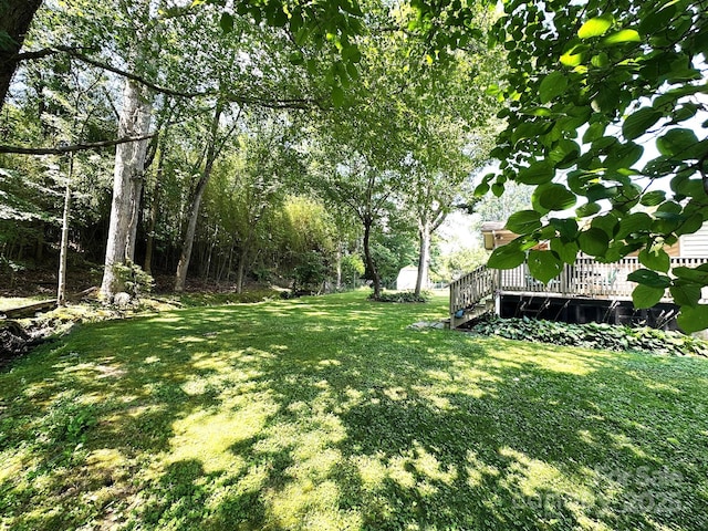 25 Norman Rd, Fletcher, NC 28732 - view of green lawn featuring a deck