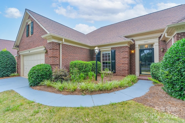10511 Pullengreen Dr, Charlotte, NC 28277 - view of side of home featuring brick siding and roof with shingles
