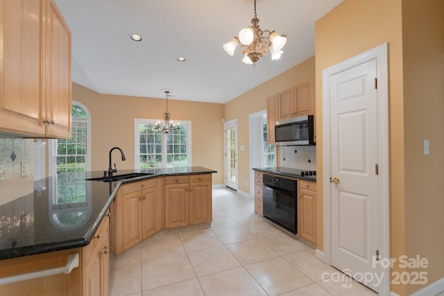 10511 Pullengreen Dr, Charlotte, NC 28277 - kitchen featuring a chandelier, stainless steel microwave, black oven, a peninsula, and light brown cabinetry