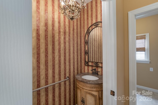 10511 Pullengreen Dr, Charlotte, NC 28277 - half bath with vanity and a chandelier
