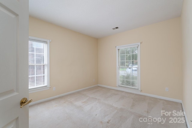 10511 Pullengreen Dr, Charlotte, NC 28277 - carpeted empty room featuring baseboards