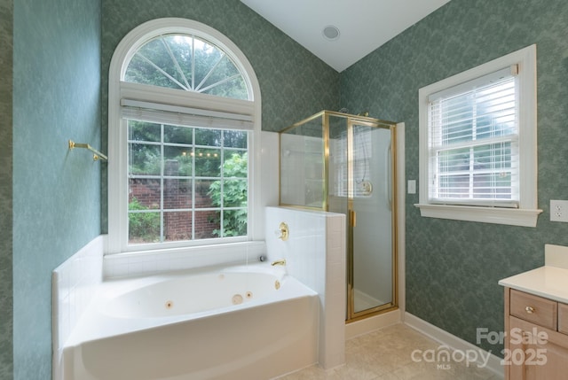 10511 Pullengreen Dr, Charlotte, NC 28277 - bathroom featuring a whirlpool tub, vanity, a shower stall, plenty of natural light, and wallpapered walls