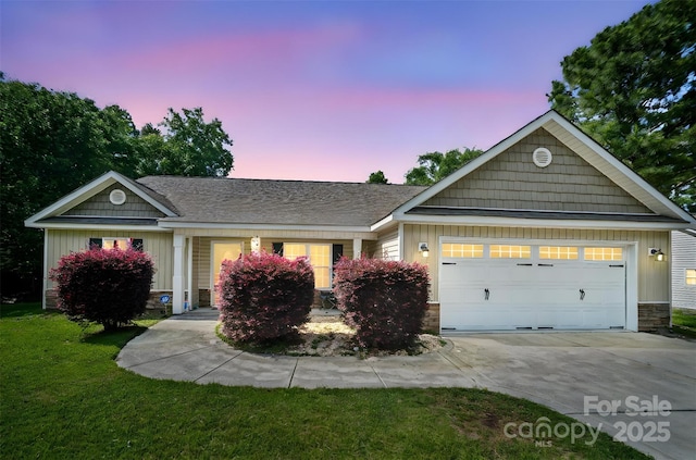 239 Shellbank Dr, Sneads Ferry, NC 28460 - single story home featuring driveway, stone siding, a garage, board and batten siding, and a front lawn