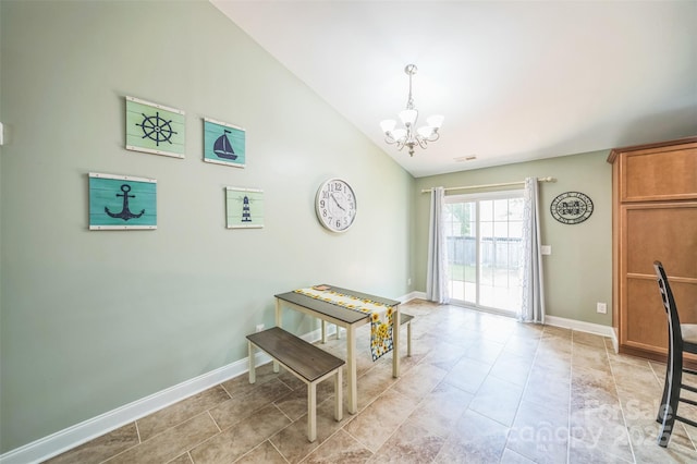 239 Shellbank Dr, Sneads Ferry, NC 28460 - dining space featuring a chandelier, vaulted ceiling, and light tile patterned floors