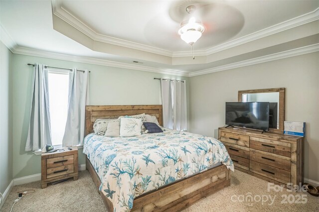 239 Shellbank Dr, Sneads Ferry, NC 28460 - carpeted bedroom with a raised ceiling, crown molding, and a ceiling fan