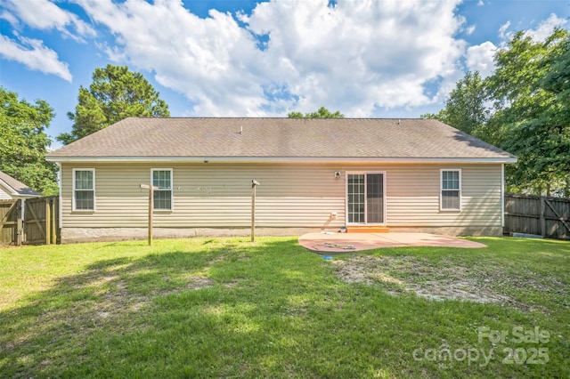 239 Shellbank Dr, Sneads Ferry, NC 28460 - rear view of house featuring a patio area, a fenced backyard, and a shingled roof