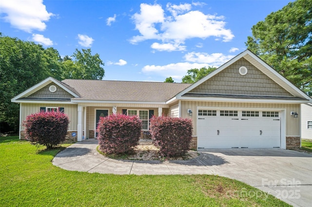 239 Shellbank Dr, Sneads Ferry, NC 28460 - ranch-style house featuring stone siding, concrete driveway, a garage, board and batten siding, and a front yard