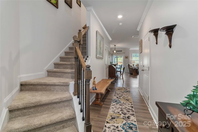 1076 Chicory Trce, Clover, SC 29710 - stairway featuring crown molding, wood finished floors, and ceiling fan
