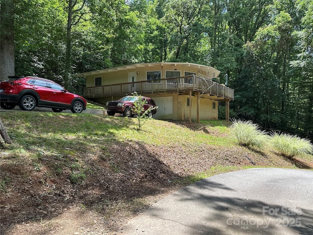 171 Windy Hill Dr, Franklin, NC 28734 - view of home's exterior with a wooden deck and a forest view