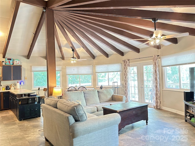171 Windy Hill Dr, Franklin, NC 28734 - living area featuring a ceiling fan, plenty of natural light, french doors, and light stone finish floors