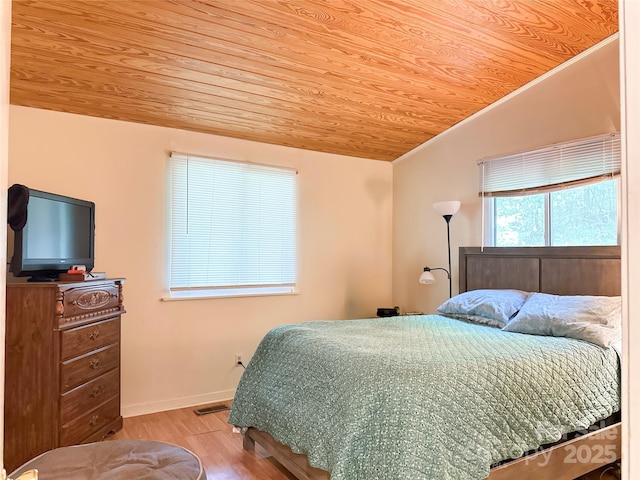 171 Windy Hill Dr, Franklin, NC 28734 - bedroom with wood ceiling and wood finished floors