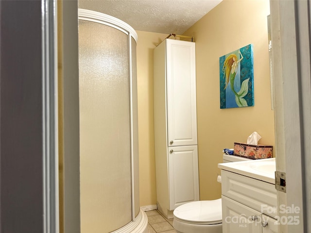 171 Windy Hill Dr, Franklin, NC 28734 - full bath with a shower stall, vanity, tile patterned flooring, and a textured ceiling
