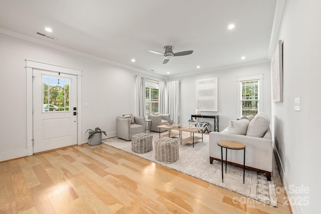 5305 Tarrywood Ln, Charlotte, NC 28205 - living area with plenty of natural light, wood finished floors, recessed lighting, ornamental molding, and ceiling fan