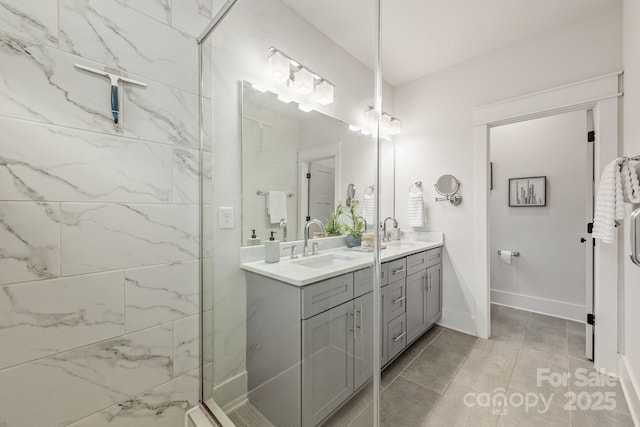 5305 Tarrywood Ln, Charlotte, NC 28205 - bathroom featuring double vanity and baseboards