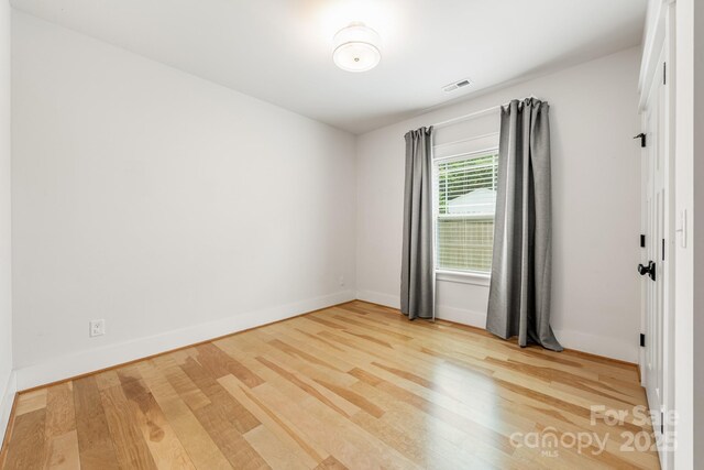 5305 Tarrywood Ln, Charlotte, NC 28205 - spare room with wood finished floors