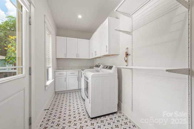 5305 Tarrywood Ln, Charlotte, NC 28205 - laundry area with cabinet space, light flooring, washing machine and clothes dryer, and recessed lighting