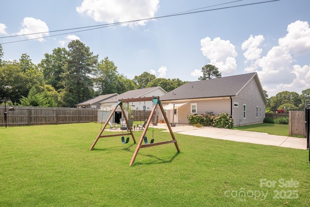 5305 Tarrywood Ln, Charlotte, NC 28205 - rear view of property with a playground and a fenced backyard
