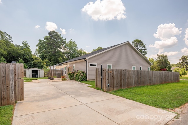 5305 Tarrywood Ln, Charlotte, NC 28205 - view of home's exterior with a shed, concrete driveway, and a patio