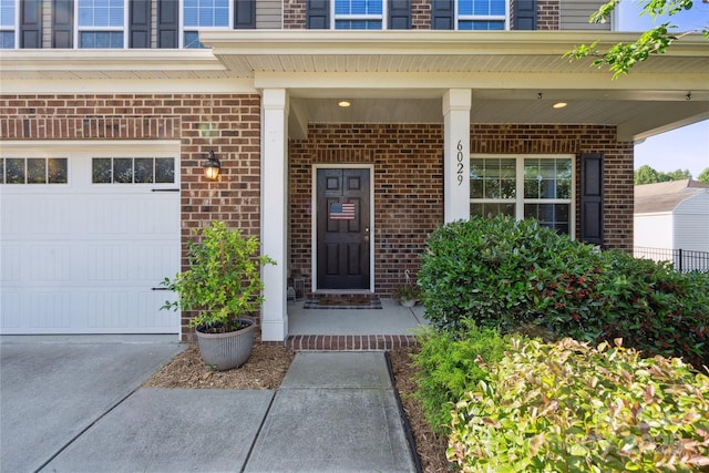 6029 Piscataway Ct, Rock Hill, SC 29732 - entrance to property featuring brick siding, a porch, and driveway