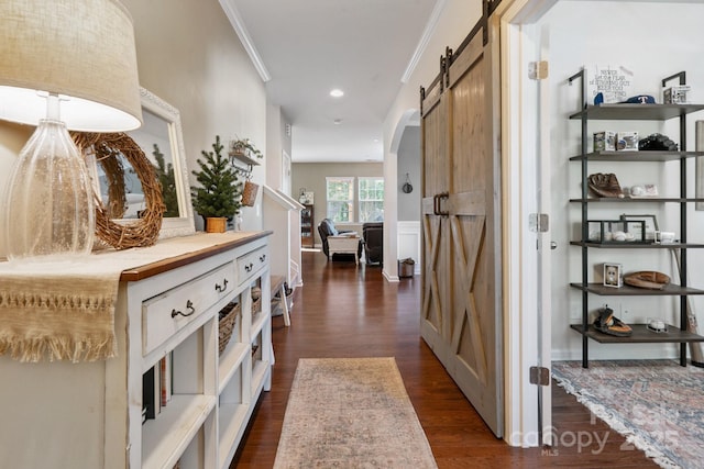 6029 Piscataway Ct, Rock Hill, SC 29732 - hall featuring crown molding, a barn door, dark wood-style flooring, and recessed lighting
