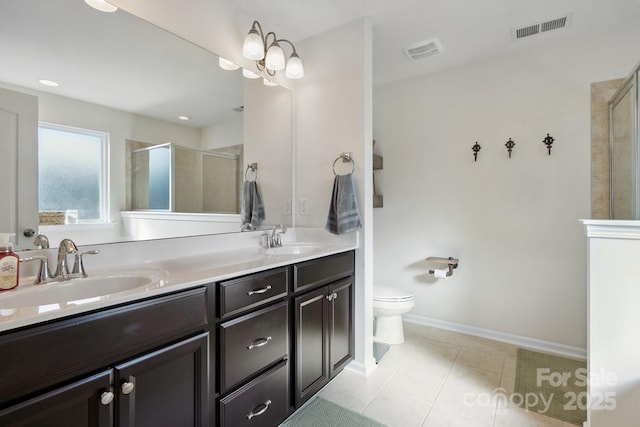 6029 Piscataway Ct, Rock Hill, SC 29732 - bathroom with double vanity, a shower stall, and tile patterned flooring
