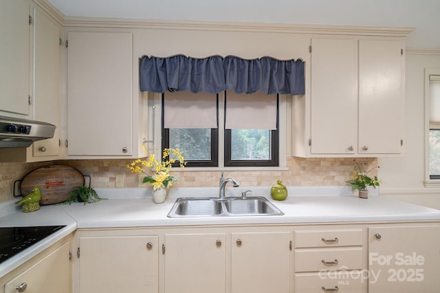 302 Planetree Dr, Belmont, NC 28012 - kitchen featuring light countertops, decorative backsplash, exhaust hood, and black electric stovetop