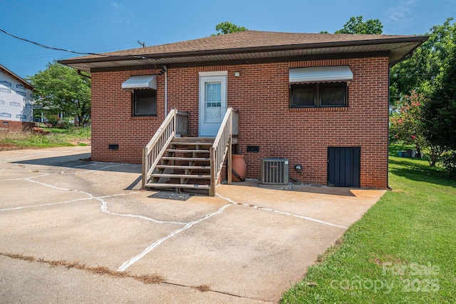 302 Planetree Dr, Belmont, NC 28012 - rear view of house with brick siding, a shingled roof, and crawl space