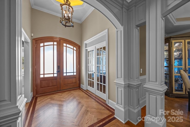 3211 Keady Mill Loop, Kannapolis, NC 28081 - foyer entrance featuring french doors, arched walkways, a chandelier, and ornamental molding