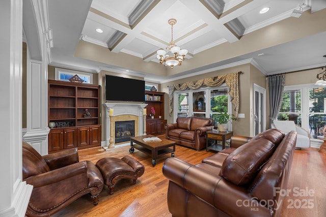 3211 Keady Mill Loop, Kannapolis, NC 28081 - living room featuring a chandelier, ornamental molding, wood finished floors, a high end fireplace, and beam ceiling