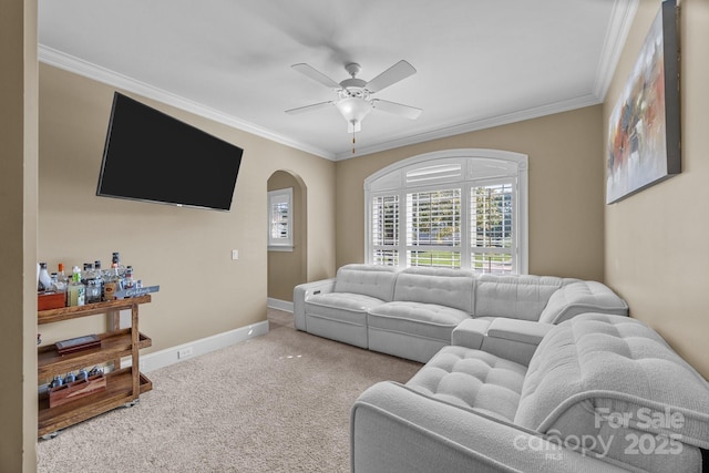 3211 Keady Mill Loop, Kannapolis, NC 28081 - carpeted living room featuring ornamental molding, ceiling fan, and arched walkways