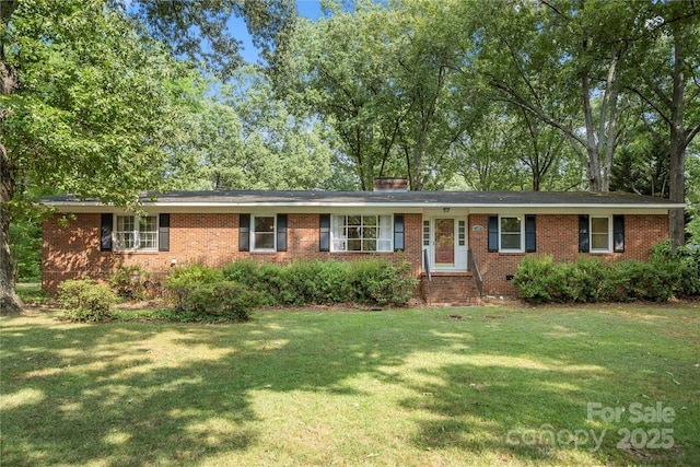 725 Plantation Rd, Lancaster, SC 29720 - ranch-style home with a front lawn and brick siding