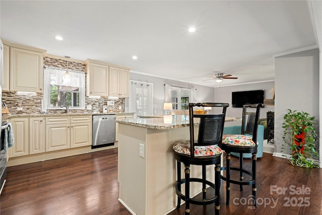 725 Plantation Rd, Lancaster, SC 29720 - kitchen featuring stainless steel dishwasher, cream cabinets, a ceiling fan, crown molding, and a kitchen island