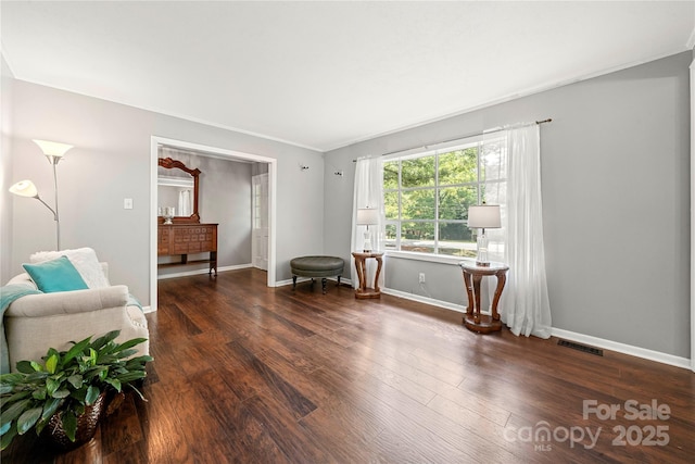 725 Plantation Rd, Lancaster, SC 29720 - living area featuring wood finished floors and crown molding