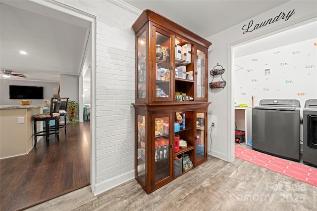 725 Plantation Rd, Lancaster, SC 29720 - washroom with washer and dryer, wood finished floors, and ceiling fan
