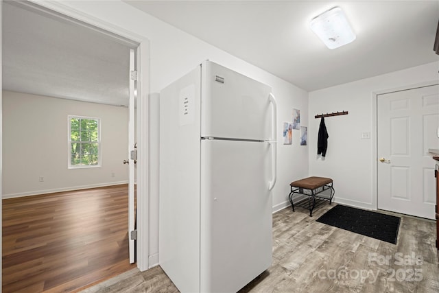 725 Plantation Rd, Lancaster, SC 29720 - kitchen featuring freestanding refrigerator and wood finished floors